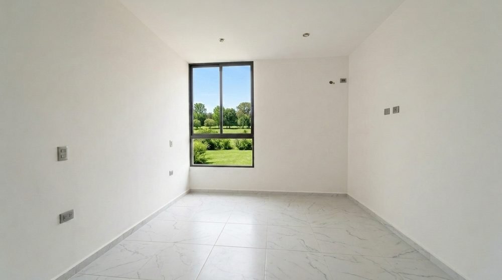 Sala–comedor sin amueblar de la Casa Dalia